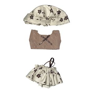 Labubu brown floral outfit.